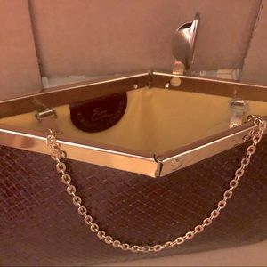 Etra genuine leather clutch. Has chain to wear as a purse as well.